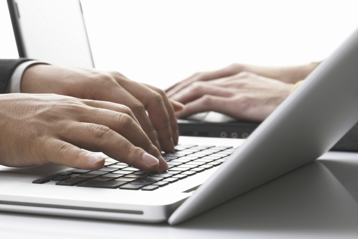 Computer and man hands